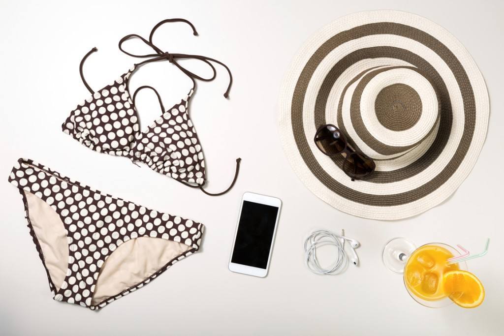 Collage of woman clothing and accessories isolated on white
